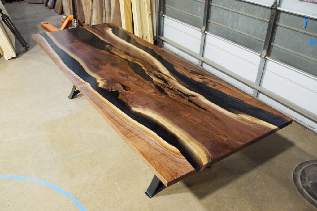 http://Walnut%20Dining%20Table%20With%20Translucent%20Black%20Epoxy%20River%20&%20Stones%206