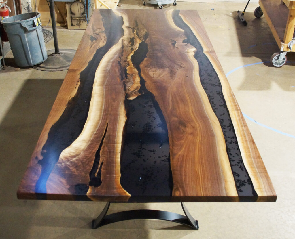 http://Walnut%20Dining%20Table%20With%20Translucent%20Black%20Epoxy%20River%20&%20Stones%204