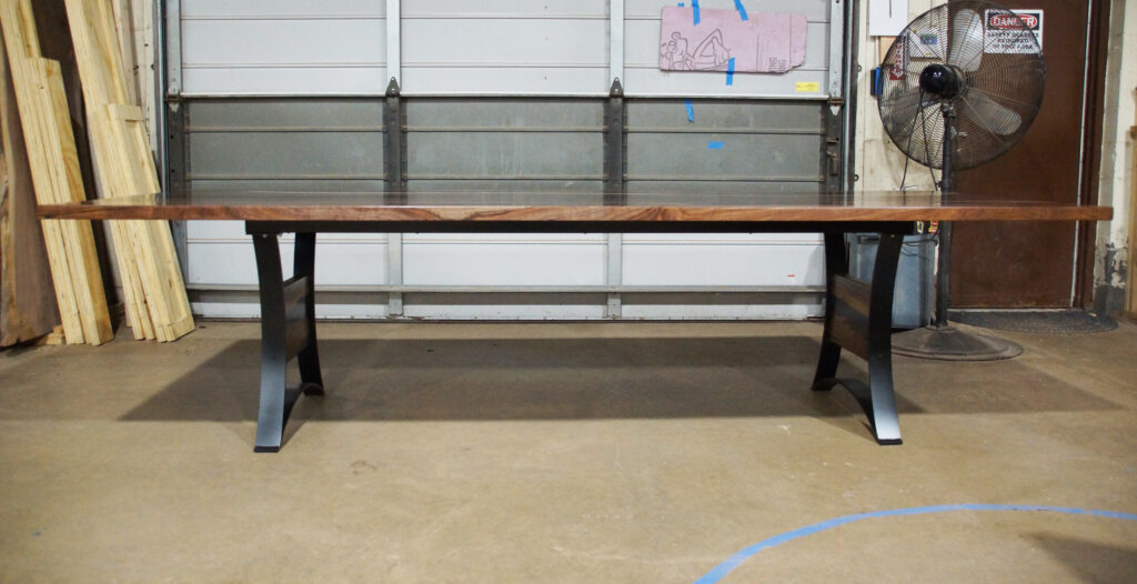 http://Walnut%20Dining%20Table%20With%20Translucent%20Black%20Epoxy%20River%20&%20Stones%203