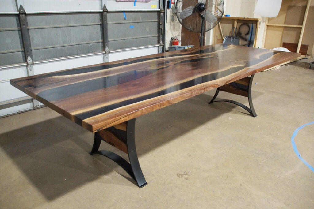 http://Walnut%20Dining%20Table%20With%20Translucent%20Black%20Epoxy%20River%20&%20Stones%201