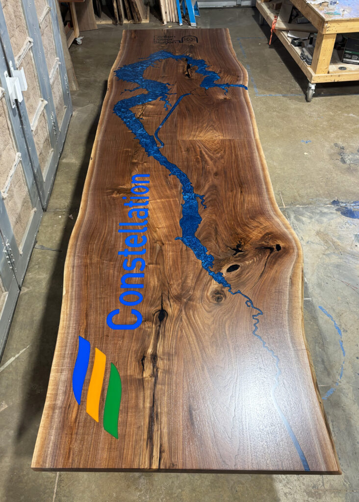 http://Live%20Edge%20Walnut%20Conference%20Table%20With%20Topography%20And%20Custom%20Logos%203