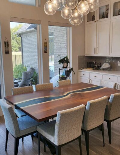 epoxy dining room table with embedded rocks gold