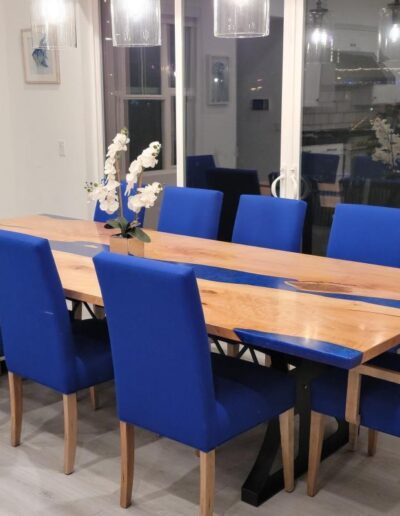 epoxy dining room table with blue epoxy river
