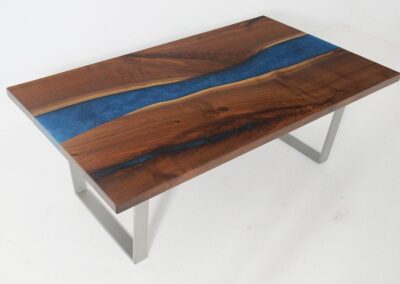 river coffee tables ($3,500 to $5,000)
