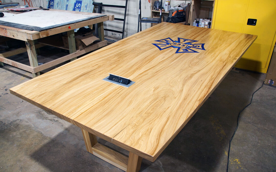 Elm Conference Table With Epoxy-Filled CNC IATSE Logo