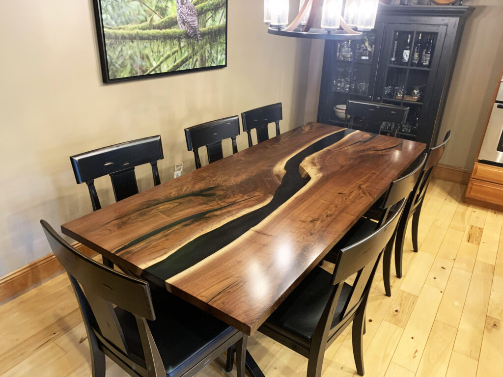 http://Two%20Layered%20Black%20Resin%20River%20Dining%20Table%201