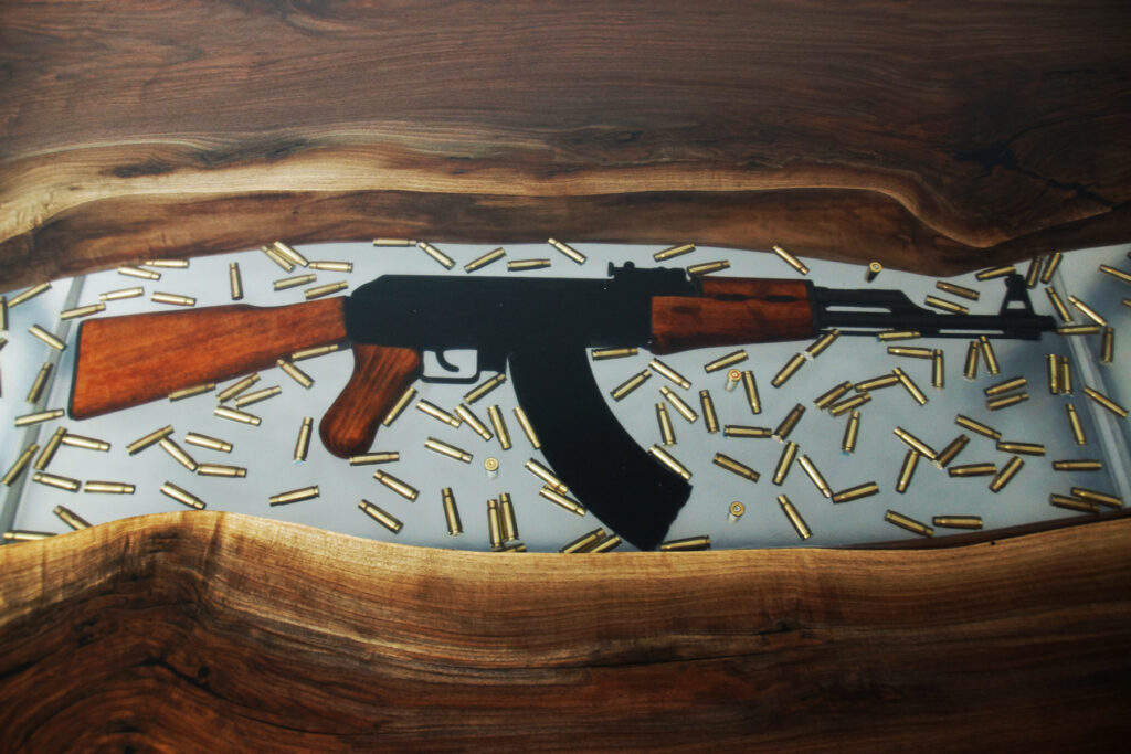 http://Conference%20Resin%20River%20Table%20With%20Embedded%20Firearm%20And%20Bullets%208
