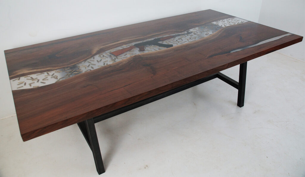 http://Conference%20Resin%20River%20Table%20With%20Embedded%20Firearm%20And%20Bullets%202