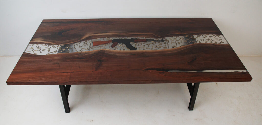 http://Conference%20Resin%20River%20Table%20With%20Embedded%20Firearm%20And%20Bullets%201
