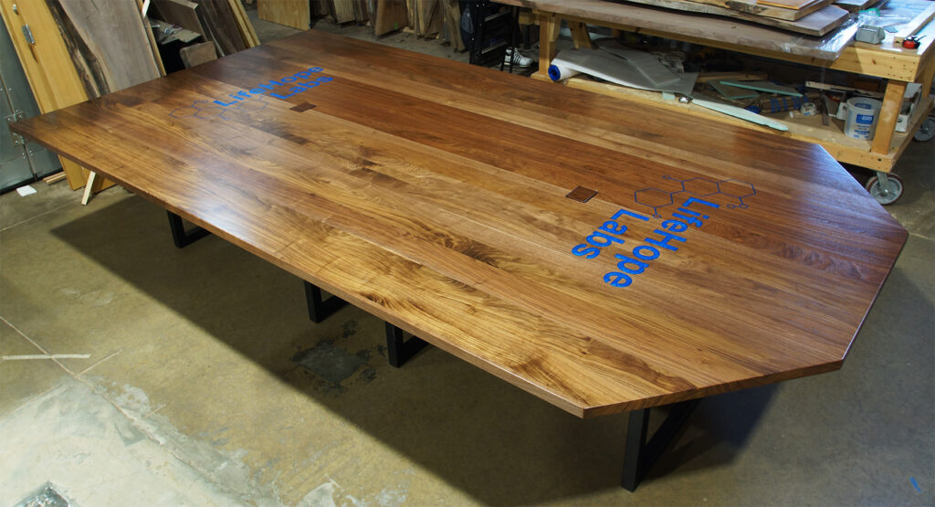 http://Walnut%20Plank%20Conference%20Table%20With%20CNC%20Logo%2012