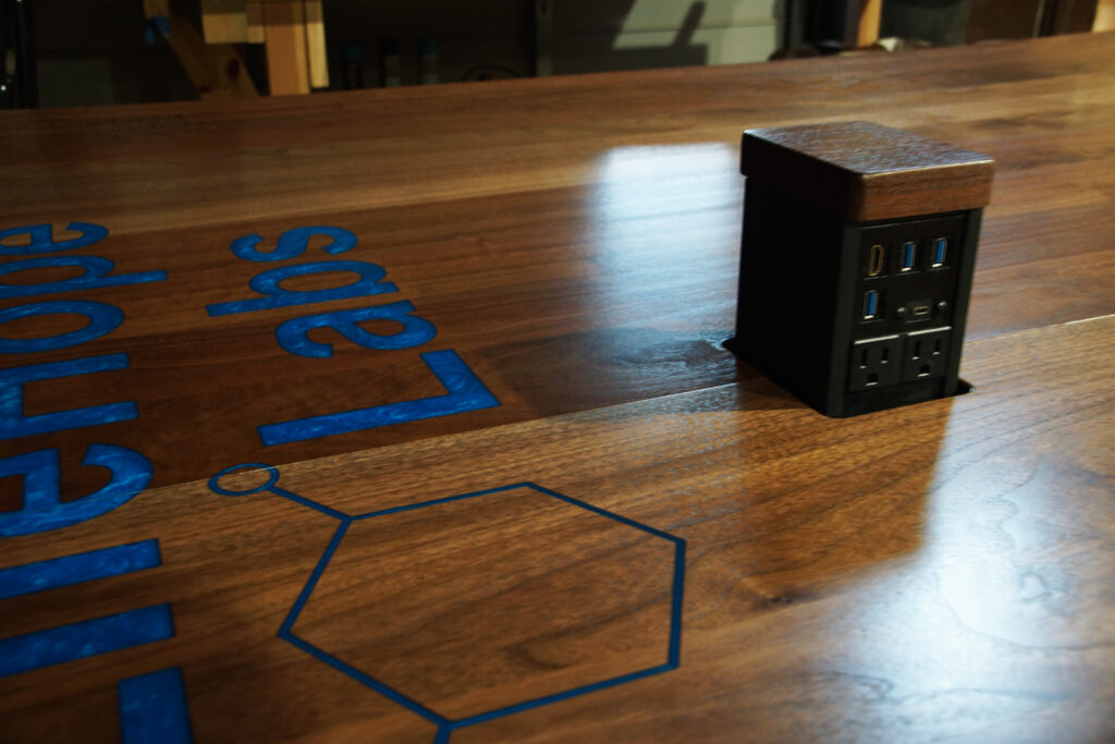 http://Walnut%20Plank%20Conference%20Table%20With%20CNC%20Logo%203
