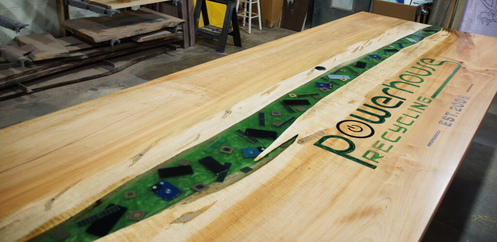 http://Large%20Conference%20River%20Table%20With%20CNC%20Logo%20&%20Embedded%20Electronics%202