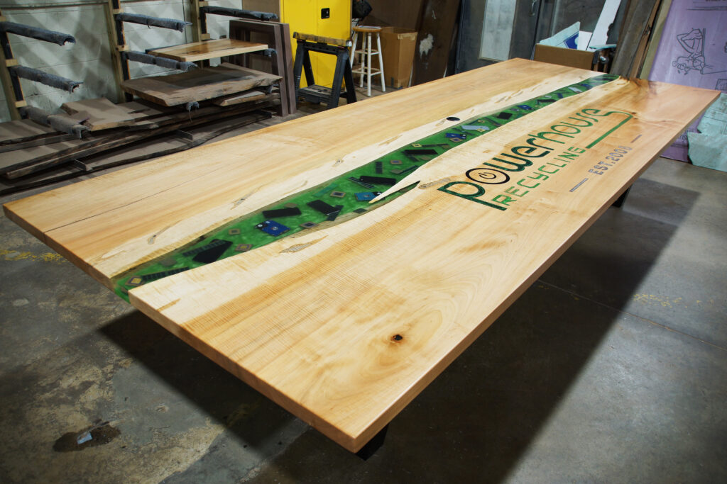 http://Large%20Conference%20River%20Table%20With%20CNC%20Logo%20&%20Embedded%20Electronics%201