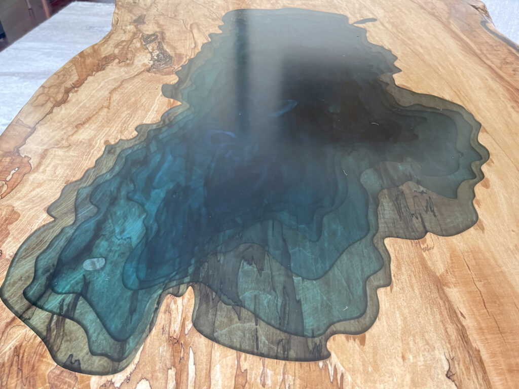 http://Spalted%20Maple%20Coffee%20Table%20With%20CNC%20Engraved%20Lake%20Tahoe%208