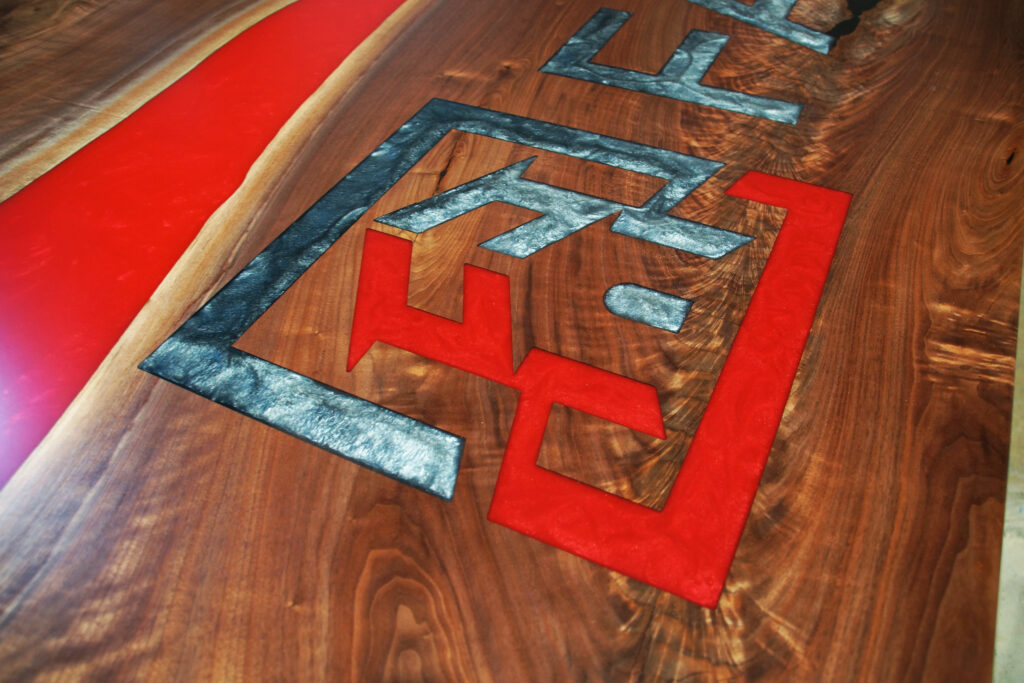 http://CNC%20Logo%20Conference%20Table%20With%20Epoxy%20Gradient%203