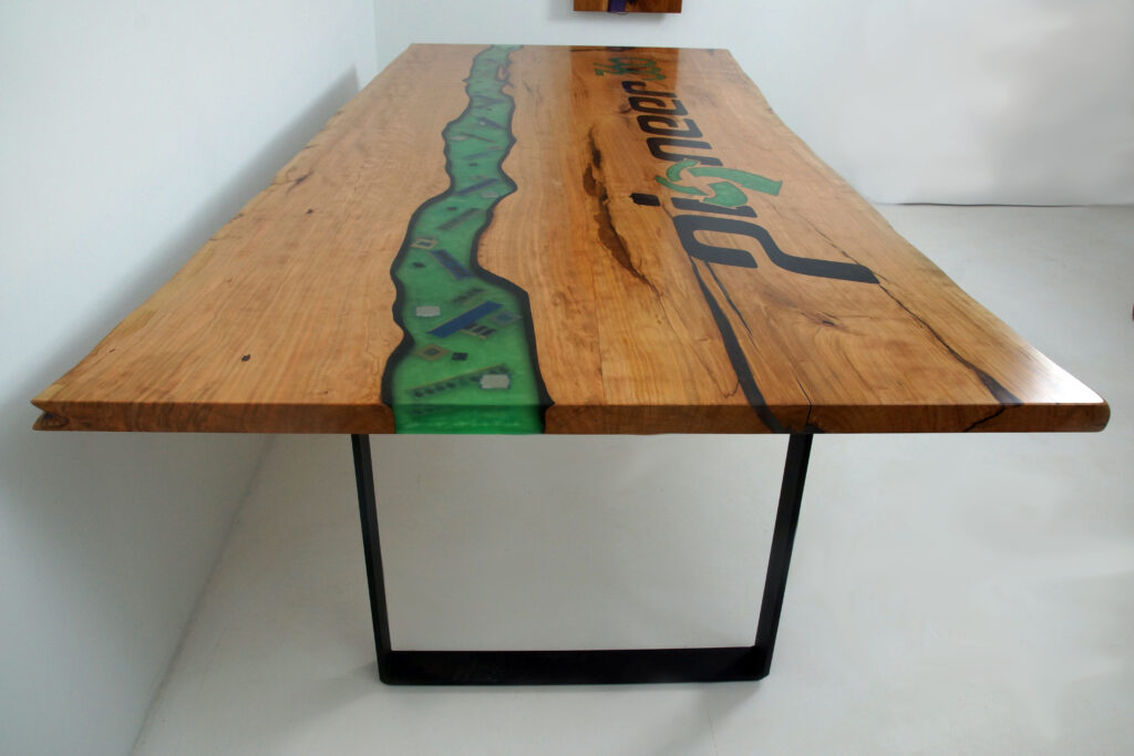 http://Epoxy%20River%20Conference%20Table%20with%20CNC%20Carved%20Logo%201