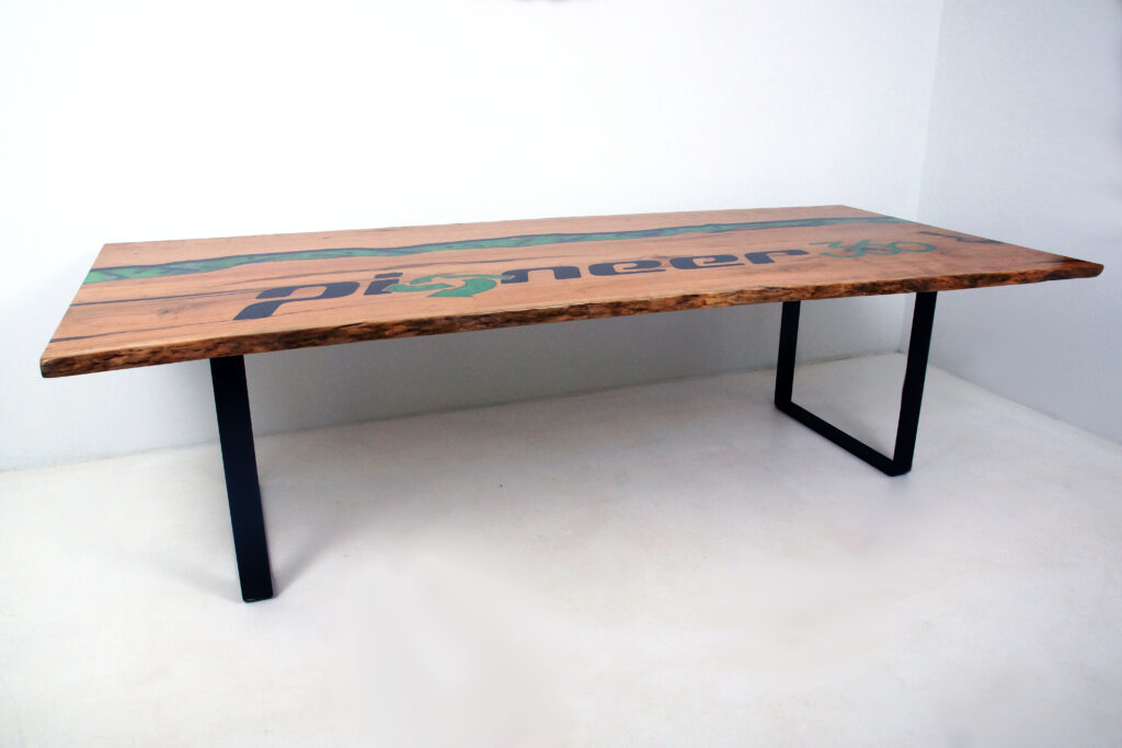 http://Epoxy%20River%20Conference%20Table%20with%20CNC%20Carved%20Logo%203