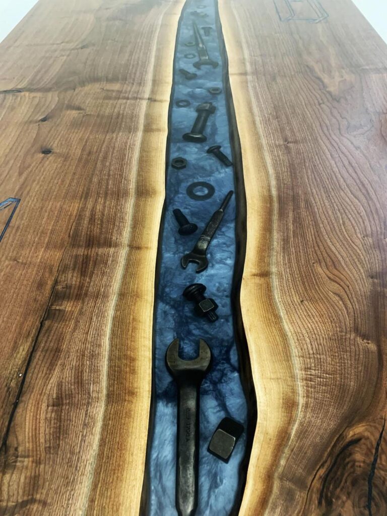 http://Walnut%20Conference%20River%20Table%20With%20Embedded%20Tools%20And%20CNC%20Logo%204