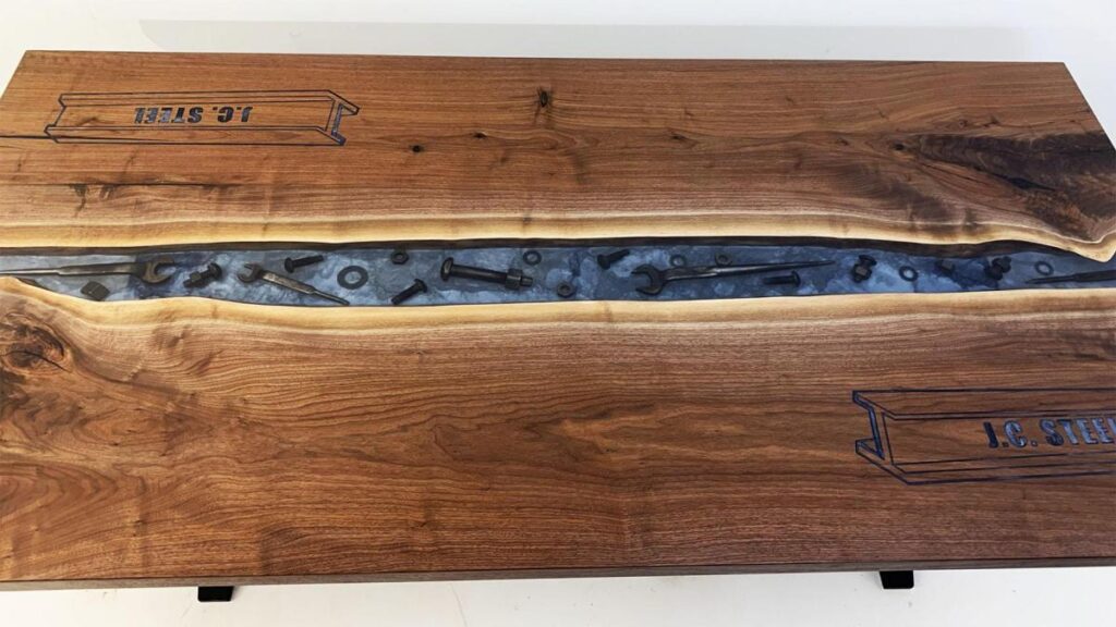 http://Walnut%20Conference%20River%20Table%20With%20Embedded%20Tools%20And%20CNC%20Logo%205