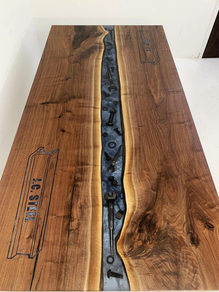 http://Walnut%20Conference%20River%20Table%20With%20Embedded%20Tools%20And%20CNC%20Logo%207