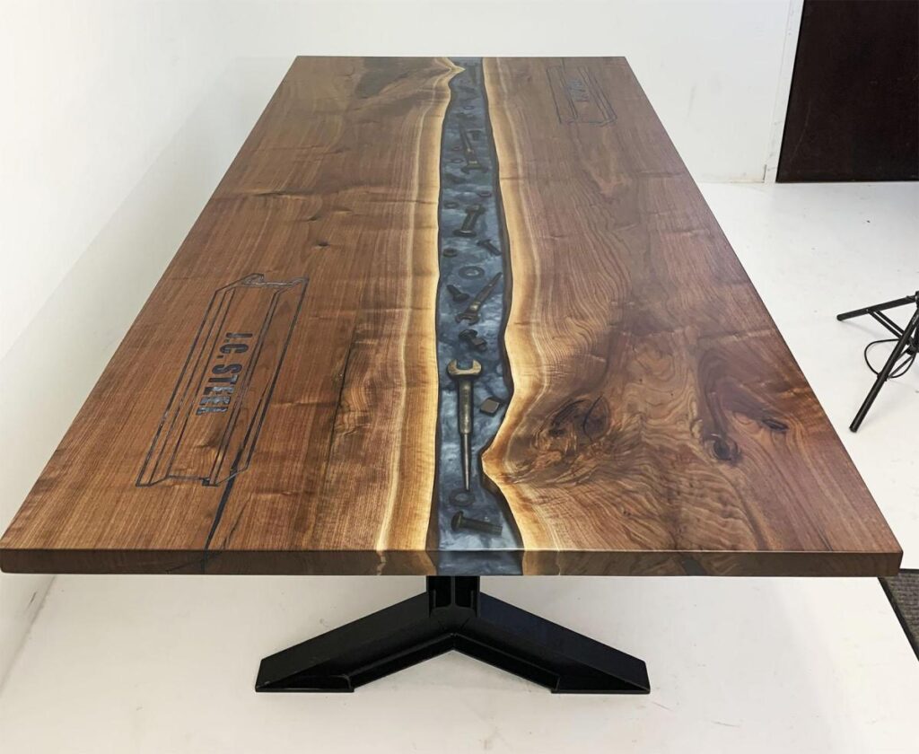 http://Walnut%20Conference%20River%20Table%20With%20Embedded%20Tools%20And%20CNC%20Logo%2012