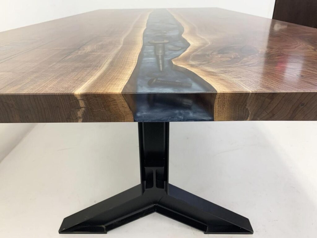 http://Walnut%20Conference%20River%20Table%20With%20Embedded%20Tools%20And%20CNC%20Logo%2013