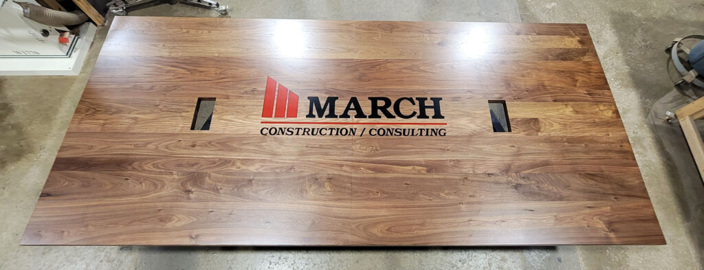 http://Walnut%20Conference%20Table%20With%20CNC%20Logo%20And%20Cable%20Grommets%207