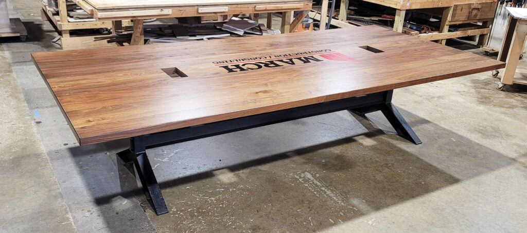 http://Walnut%20Conference%20Table%20With%20CNC%20Logo%20And%20Cable%20Grommets%209