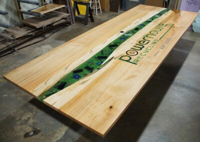 engraved conference table with cnc logo embedded phones