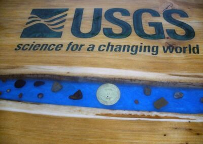 custom conference table with engraved logo embedded rocks custom wood furniture