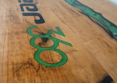 epoxy river conference table with engraved logo custom wood furniture