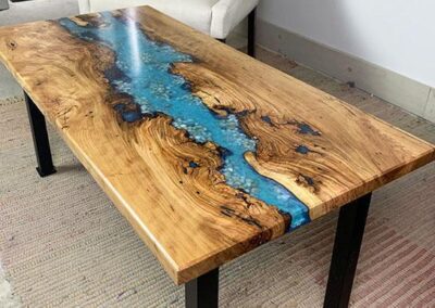 epoxy coffee table with embedded rocks custom wood furniture