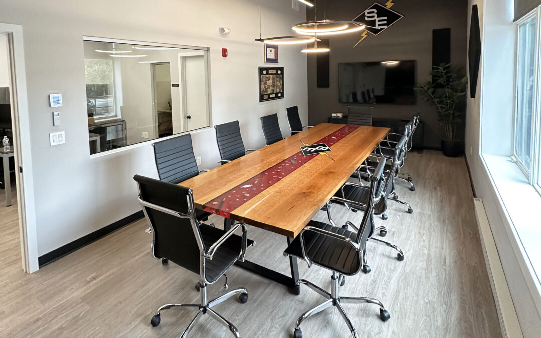Cherry Conference Table With Embedded Objects And River With Logo