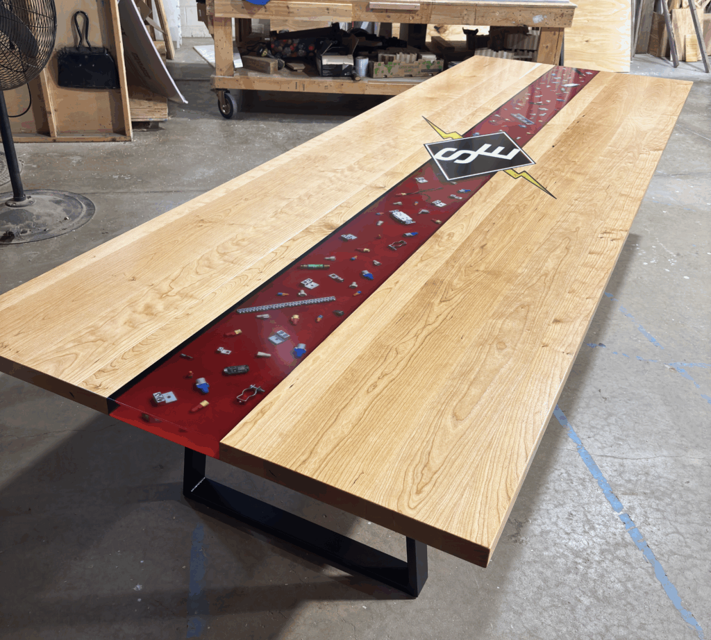 http://Cherry%20Conference%20Table%20With%20Embedded%20Objects%20And%20River%20With%20Logo%207