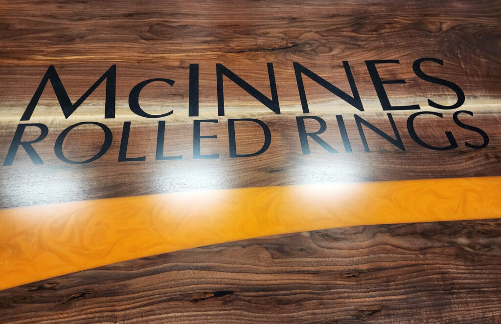 http://Walnut%20Conference%20Table%20With%20CNC%20Logo%20And%20Orange%20Resin%204